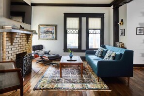 Enjoy the extra deep sofa or the Eames chair while you catch up with friends or watch your favorite show or movie