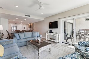 Living Room, Dining Area and Kitchen at 1841 Beachside Tennis