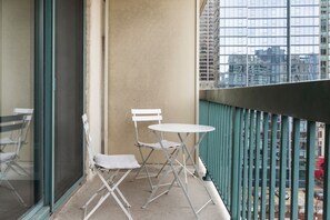 Enjoy some fresh air on your private balcony.