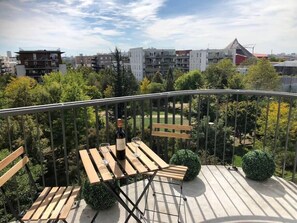 Sunny balcony with the view on the Sacré Cœur