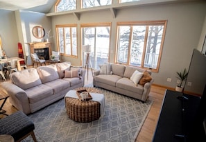 Plenty of seating for everyone in this spacious upper level living room.