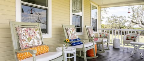 Ample seating on the porch.