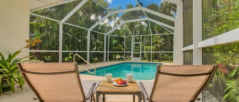 Private pool area with lush landscaping surrounded entire backyard and pool area