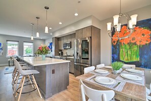 Inside on the 1st floor is an incredibly warm and inviting open floor plan.