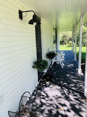 Relax and while away the time on the shady verandah
