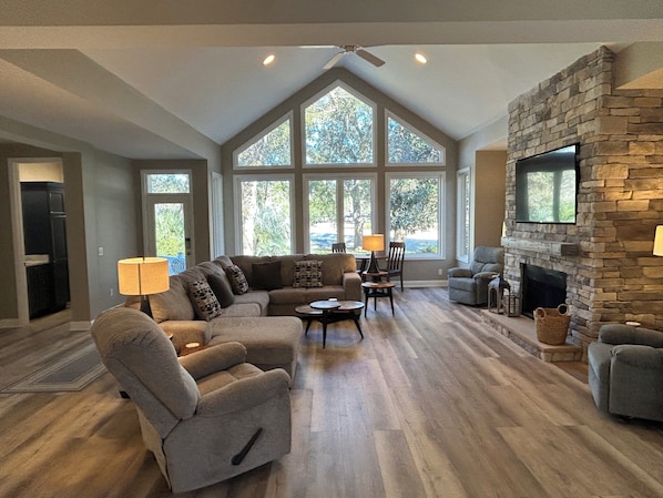 Family room overlooking the pool and the Fazio golf course