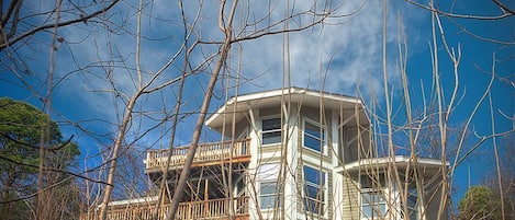 Front of home that faces the mountains. Wonderful views from 2d & 3d floor decks