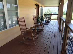 Enjoy the view and a cup of coffee in the rockers on the front porch