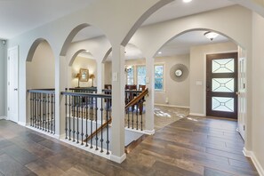 Spacious Entryway, stairs down to the basement