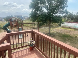 Play area, tetherball, fire pit, 16x20 deck, seating.