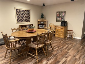 Dining area seats 6. Additional table leaves available and desk WIFI work space.