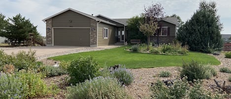 Immaculate ranch style home in Falcon, CO on 1/2 acre lot, basement rental.
