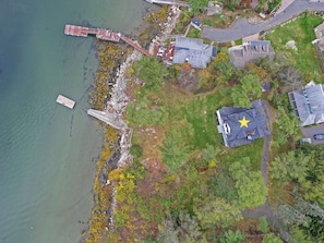 Aerial view of Annisquam Singing Pines (starred) and the river.