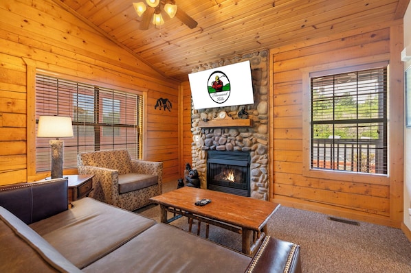 Living Room with Cable TV and Seasonal Fireplace