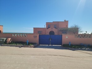 Large gated courtyard for off street car parking and safe for pets.  OCEANFRONT