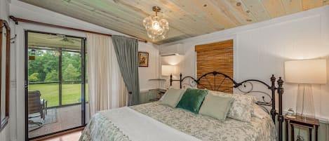 The Mountain Meadow bedroom with your screen porch. Great view of the sunset.