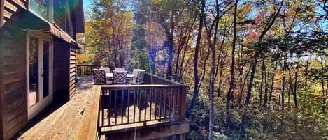 Gorgeous fall foliage with long range Mountain View peaking through the trees. 