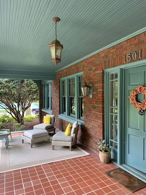 Oversized front porch. Parking under port chere to the side of porch. 