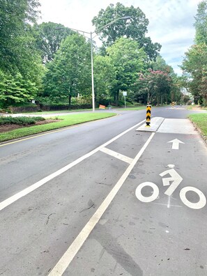 Designated bike lane on street in front of home. 