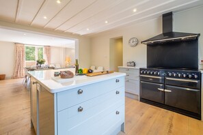 Alexander House, Thorpeness: Kitchen area with Aga range cooker
