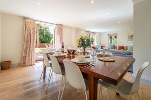 Ground floor: Open-plan living space with dining table