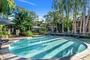 Enjoy access to Sea Temple Resort's three swimming pools—catering to children and adults alike.