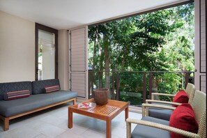 The private patio offers a leafy, treetop escape to sip on your morning coffee as the sun rises.