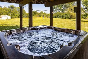 Enjoy slipping into the hot tub for a relaxing dip