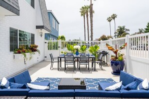 Beautiful front yard space is shared among 4 units.  There is an additional BBQ and seating area in the back (not pictured)