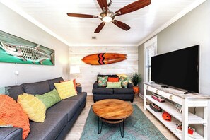 Tropical meets surf in our cozy living area.