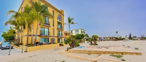 Ground floor condo with outdoor patio located right next to the Mission Beach Boardwalk. Scenic views of beach and bay. 
"Everything was spectacular. The condo has more than enough room and the location is fantastic." - David (guest)