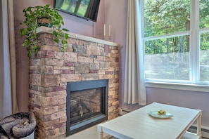 Turn on the gas fireplace for a cozy ambiance.