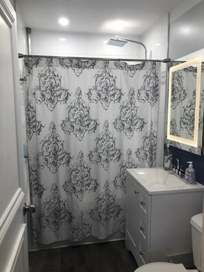 Bathroom With Rainfall Shower Head
