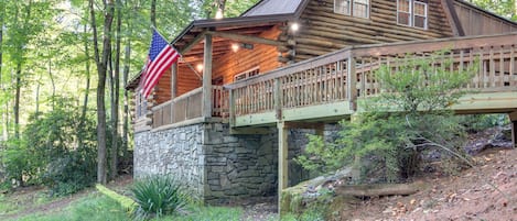 Authentic log cabin with relaxing front porch and plenty of privacy.
