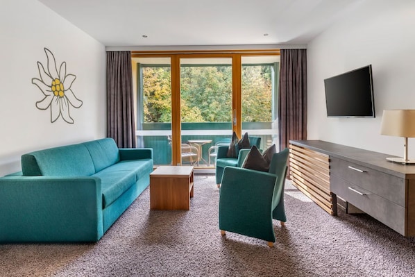 Comfortable seating against the backdrop of picturesque windows.