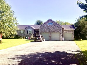 Guest parking is located on the righthand side of the driveway. 
