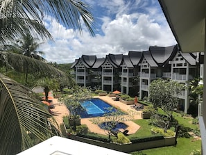 Master bedroom balcony with a great view of the pools