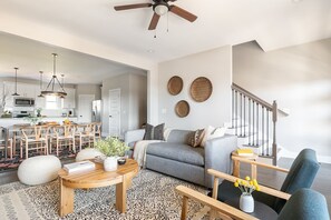 Living area contains a queen sleeper sofa.