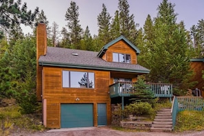 The home. Note the proximity to neighbors. Garage is for owner use only.