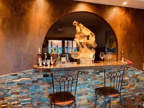 Bar allows visiting with the chef and pass through for nibbles and drinks