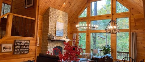 Ahhh these windows! Experience all the outside seated by the cozy fire inside.
