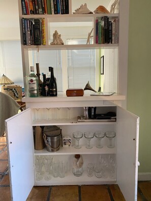 The home is decorated with an author’s theme and a 1945 feel complete with a bar
