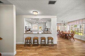 Open concept kitchen/living space.