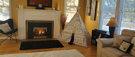 Spacious living room area; for lounging, playing games, or watching tv.