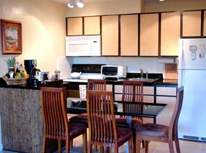 Complete Kitchen with Full-Size Appliances; Dining Area Seats up to Five