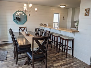 Dining table for eight and four bar stools