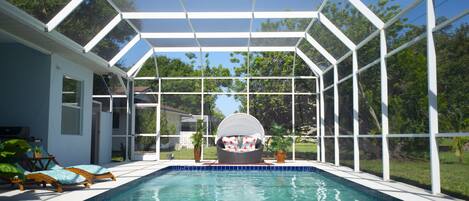 Salt water, heated pool. 

Unfortunately hurricane Ian destroyed our pool cage. 