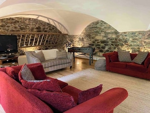 There are three comfortable sofas, table football, a DVD player and games console ready to be enjoyed.