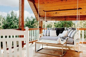 Do you prefer to swing or rock?  Take your pick on our covered balcony.
