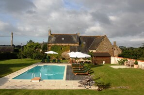 Secluded garden with beautiful heated swimming pool.